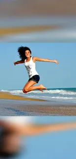 Woman joyfully jumping on a sunny beach background.