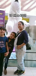 Family enjoys mall day with polar bear.