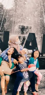 Children posing by a large fountain with a relaxing atmosphere.