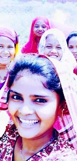 Group of women taking a joyful outdoor selfie.