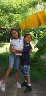 Children hugging joyfully in a lush outdoor garden scene.