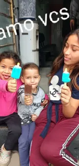 Kids enjoying colorful popsicles outdoors, smiling joyfully.