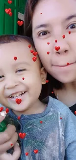 Mother and child smiling with red hearts overlay.