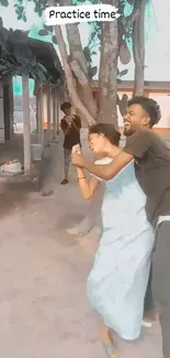 Two people joyfully practicing outdoors.