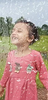 Child smiling joyfully in the rain, with a vibrant natural background.