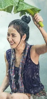 Woman smiling under a leaf in the rain.