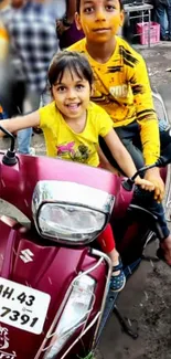 Children enjoying a joyful scooter ride on a sunny day.