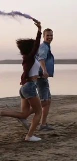 Couple joyfully runs along beach at sunset, vibrant colors.