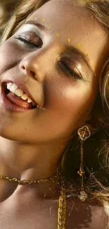 Radiant woman smiling in sunlight, wearing golden jewelry.