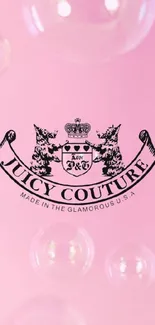 Juicy Couture crest on a pink background with bubbles wallpaper.