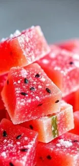 Stack of juicy watermelon candy cubes with sugar.