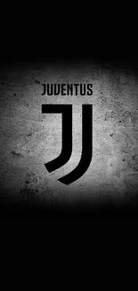 Juventus logo on textured dark background.