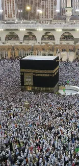 High view of the Kaaba surrounded by pilgrims in Mecca, Saudi Arabia.