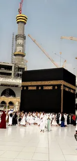 Majestic view of the Kaaba in Mecca surrounded by pilgrims.