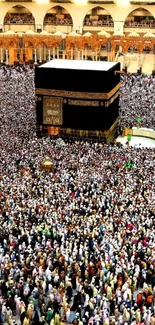 Crowd of pilgrims in Mecca around the Kaaba, a sacred Islamic site.