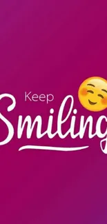 Magenta wallpaper with 'Keep Smiling' text and smiley emoji.