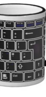 A mug with a keyboard design, black handle, and modern look.