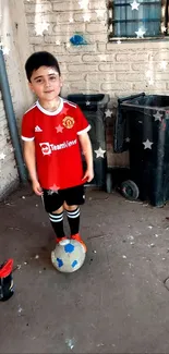 Child in red jersey with soccer ball and starry background.