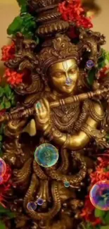 Krishna brass statue with floral decorations as mobile wallpaper.