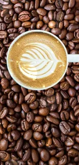 Coffee cup with latte art on coffee beans background.