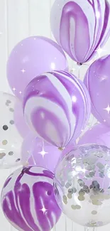 Lavender balloons with marble patterns against a white background.