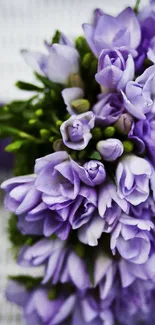 Lavender bouquet on a woven white background.