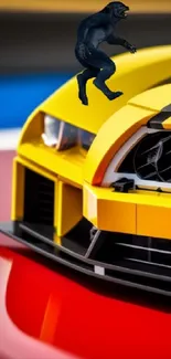 LEGO car with a miniature monster figure on red and yellow background.