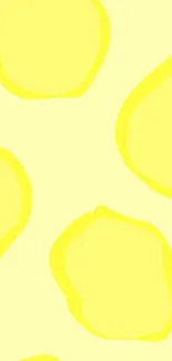 Lemon yellow abstract wallpaper with circular designs.