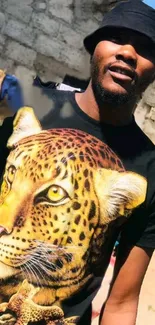 Man wearing leopard art t-shirt outdoors.