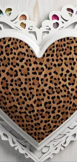 Heart-shaped leopard print design with white ornate frame.