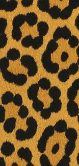 Leopard print mobile wallpaper with black spots on golden yellow background.