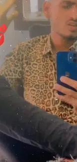 Leopard print mirror selfie wallpaper with particle effect.