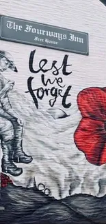 Lest We Forget mural with red poppies on a historic building facade.