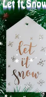 Festive 'Let It Snow' wallpaper with snowflakes and green background.