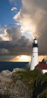 Mobile wallpaper of a lighthouse with dramatic clouds and ocean view at sunset.