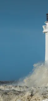 Lighthouse stands strong in stormy ocean waves, capturing nature's power.