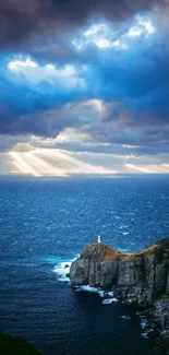 Lighthouse atop cliffs with dramatic skies and ocean backdrop.