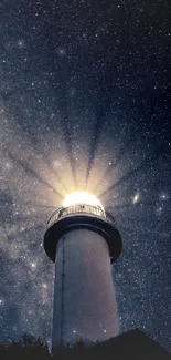 Lighthouse illuminated under a vast, starry night sky.