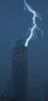 Lightning bolts hit a city skyscraper at night.