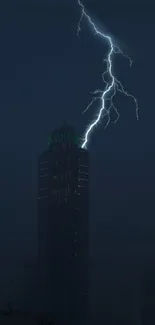 Lightning strikes skyscraper in dark cityscape at night.