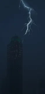 A striking lightning bolt illuminates a dark urban skyline at night.