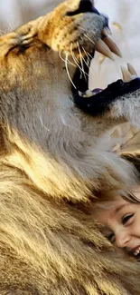 A lion roars while a child smiles beside it.