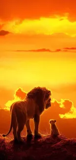 Lion and cub silhouette against vibrant sunset sky.