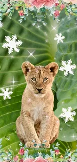 Lion cub with green leaves and floral border, adorned with snowflakes.