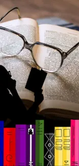 Open book with reading glasses and colorful bookshelf silhouette.