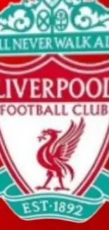 Liverpool FC crest mobile wallpaper with a vibrant red background.