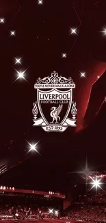 Liverpool FC wallpaper with red theme and glowing stars.