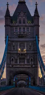 Tower Bridge in London at dusk with a vibrant sky and towering architecture.