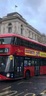 London double-decker bus on city street wallpaper.