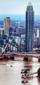 Aerial view of London skyline with river and skyscrapers.